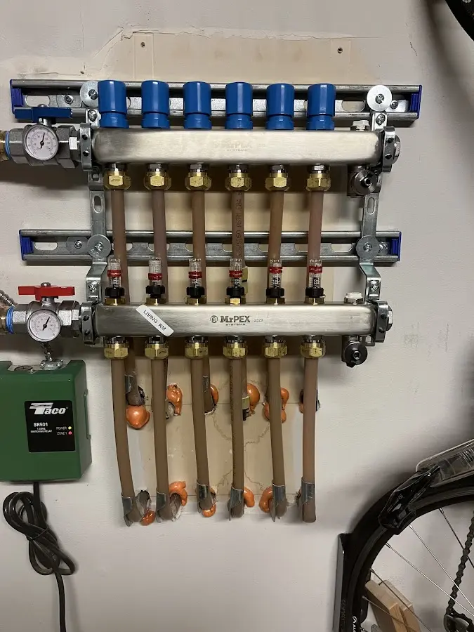 Plumber performing Leak Detection at a residential property in Woodbridge